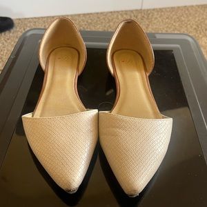 tan and cream flats